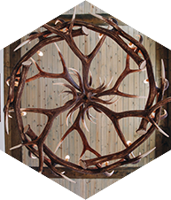 a larger hexagonal image oc the antler chandelier in the min office of creekside townhomes